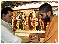  Pujya Munitilak Swami ties the nada-chhadi(Sacred Thread) on Hon. T.S.Reddy's wrist