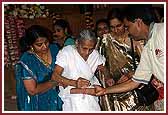 Devotees participate in the Shilanyas Vidhi