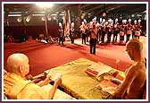  The band plays for Swamishri again as he reads the Shikshapatri  