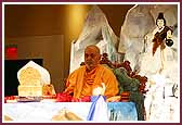  Swamishri engrossed in God while performing mala 