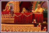   Swamishri performs mala during his morning puja