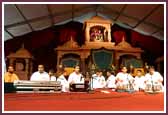 Kishores conduct a kirtan aradhana at the start of the Kishore-Kishori Din evening assembly 