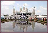  A stunning reflection of the Mandir is cast on the pond in front of it