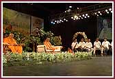   Kishores present a debate about college life in front of Swamishri