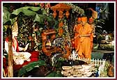  Swamishri swings Shri Harikrishna Maharaj on a hindolo at the start of the Guru Purnima celebration  