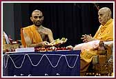 Swamishri humbly prays to Thakorji as thaal is being offered  