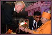 Representative John J. Millner greets Swamishri