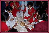 Balikas making Akshardham out of graham cracker 