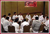 Sanchalaks discuss solutions to common problems faced in running their mandals 