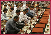 Devotees participating in the mahapuja ceremony 