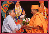 Vyomesh Joshi is being welcomed by P. Uttamprakash Swami