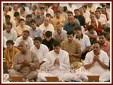 Devotees engrossed in prayer