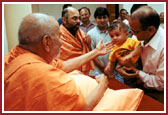 Initiation into satsang-'vartaman' to a toddler