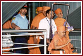 From the VIP lounge at Toronto Airport, Swamishri was escorted by security to the exit on his arrival Monday, 17 July 2000.