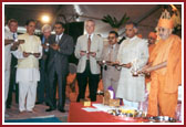 Diginitaries join Swamishri in the Foundation stone laying rituals