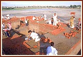 Workers and engineers are working on the site 