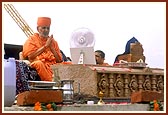 Swamishri performs the rituals for the stone-laying ceremony