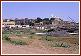 Shri Swaminarayan Mandir and the new construction complex (left)