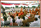 Swamishri and dignitaries engaged in the rituals