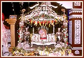 Shri Harikrishna Maharaj in a decorated swing