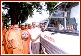 Swamishri sanctifies an ambulance donated by Dr. Sudhirbhai Patel (Bryan, USA) for BAPS hospital in Dabhoi