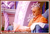 Chanting the Swaminarayan mantra in his puja