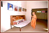 Swamishri engaged in darshan and prostrations in the sanctified room where Shastriji Maharaj resided 