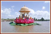  In the middle of river Utavali, Swamishri is with Shri Harikrishna Maharaj on a beautiful lotus-shaped stage