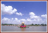 At the festival venue a decorated lotus-shaped stage was set up in the middle of the shallow river Utavali